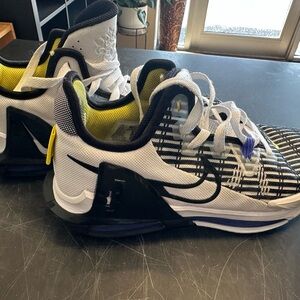 Nike Black and White Sneakers with Yellow Accents